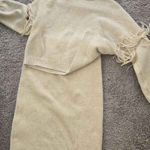 Elegant Beige Sweater with Fringe Details